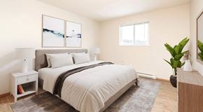 Winnipeg apartment for rent - A bedroom with a queen sized bed, two nights stands and a small dresser.