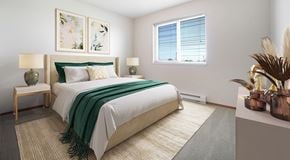 Winnipeg apartment for rent - A bedroom with a large bed and window