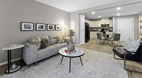 Calgary apartment for rent - a large open living room that is open to the kitchen