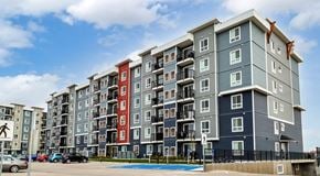 Winnipeg apartment for rent - A large apartment complex with lots of parking