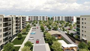 Ottawa apartment for rent - A view of a street with cars and buildings on both sides.