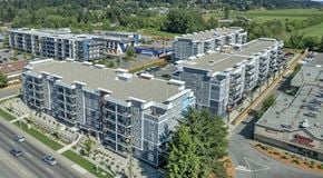 Courtenay apartment for rent - A large apartment complex next to a shopping centre