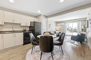 Orleans apartment for rent - A modern kitchen with a dining table and chairs.