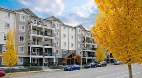 Nanaimo apartment for rent - A large apartment building with street parking out front
