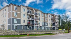 Parksville apartment for rent - A large apartment building with balconies and lots of windows