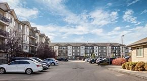 Edmonton apartment for rent - A large apartment complex with parking lot in front