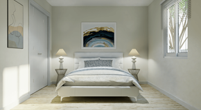 Fernie townhouse for rent - A bedroom with a large bed and a painting on the wall.