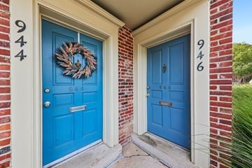 St. Louis townhouse for rent - Two blue doors with numbers 944 and 946 on the wall.