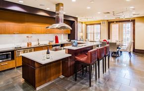 Hanover apartment for rent - A modern kitchen with a large island and a dining area.