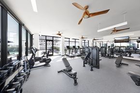 Glendale apartment for rent - A gym with a variety of equipment including treadmills, weights, and exercise machines.