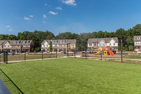 Waldorf apartment for rent - a playground in a park with houses in the background