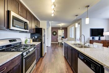 Full kitchen with granite counter tops