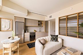 Los Angeles apartment for rent - A modern kitchen with a dining table and a couch.