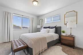 Eagle townhouse for rent - a bedroom with a large bed and a window