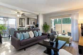 A living room with a couch and a coffee table