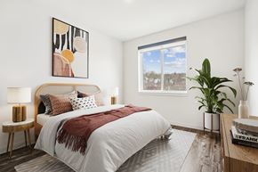 Ithaca apartment for rent - a bedroom with a bed and a window