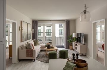 Annapolis apartment for rent - A living room with a white couch and a coffee table.