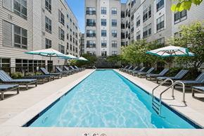 Arlington apartment for rent - A long rectangular pool with a metal ladder on the side.