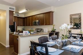 Chula Vista apartment for rent - A kitchen with a dining table set for two.