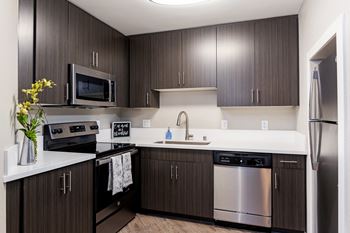 Modern kitchen with stainless steel appliances