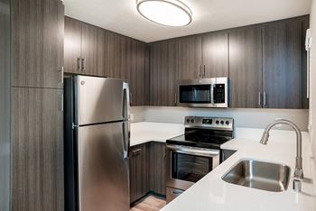 Kitchen with white counter tops