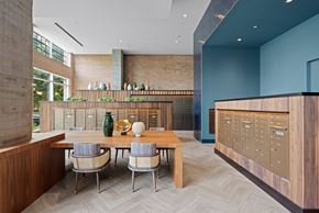 Washington apartment for rent - A modern dining room with a wooden table and chairs.