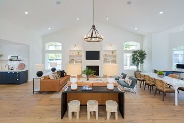 Tempe apartment for rent - a large living room with a table and chairs