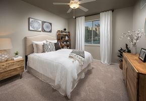 Folsom apartment for rent - one bedroom model showing bed and dresser