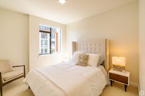 San Francisco apartment for rent - A bedroom with a large bed and a chair.