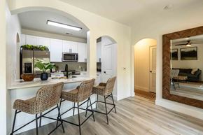 Charleston apartment for rent - A kitchen with a counter and chairs.