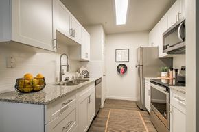 Riverton apartment for rent - Kitchen with White Cabinets at Monarch Meadows, Utah