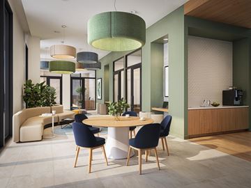 Miami apartment for rent - A modern dining room with a round table and chairs.