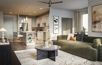 Gilbert apartment for rent - A modern living room with a green sofa and a coffee table.