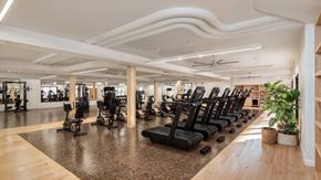 Newport Beach apartment for rent - A gym with treadmills, weights, and exercise equipment.
