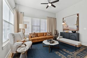 Hickory Creek apartment for rent - A living room with a chair, couch, and coffee table.