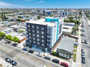 San Diego apartment for rent - an aerial view of a large building in a city