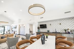 Glendale apartment for rent - A modern dining area with a white table and chairs.