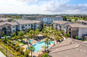 Rohnert Park apartment for rent - an aerial view of the resort style pool at the bradley braddock road station apartments