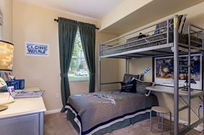 Chula Vista apartment for rent - A bedroom with a bunk bed and a poster of Clone Wars.