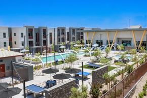 Las Vegas apartment for rent - A sunny day at the resort style pool and apartments in the background.