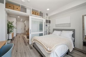 San Diego apartment for rent - a bedroom with a bed and a white bunk bed