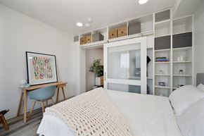 San Diego apartment for rent - a bedroom with a large bed and a white closet