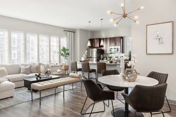 Ronkonkoma apartment for rent - A modern living room with a dining table and chairs.