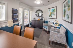 Tigard apartment for rent - Dining room with chairs and a table and a mirror at Summerfield, 97224