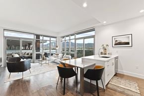Boulder apartment for rent - A modern kitchen with a dining table and chairs.