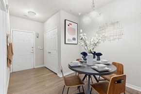 San Antonio apartment for rent - A dining room with a round table and chairs.