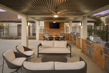 Multiple flat screen tvs located at the pool