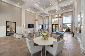 Raleigh apartment for rent - clubhouse with seating area and a pool table