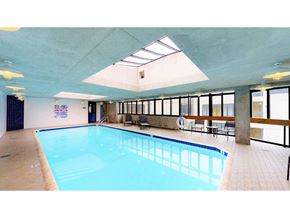 San Francisco apartment for rent - a large swimming pool with a skylight above it