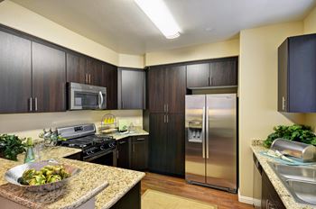Slab granite countertop w/ bullnose edge in kitchens